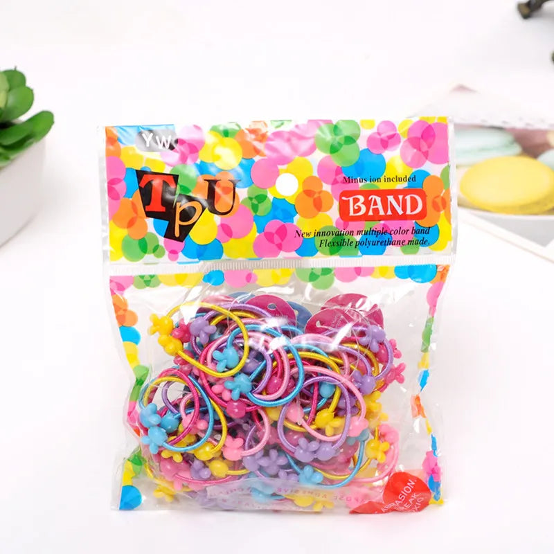 A lot of 50 PCS Hair Rubber Band, 3 CM in Diameter (a little more than one inch).