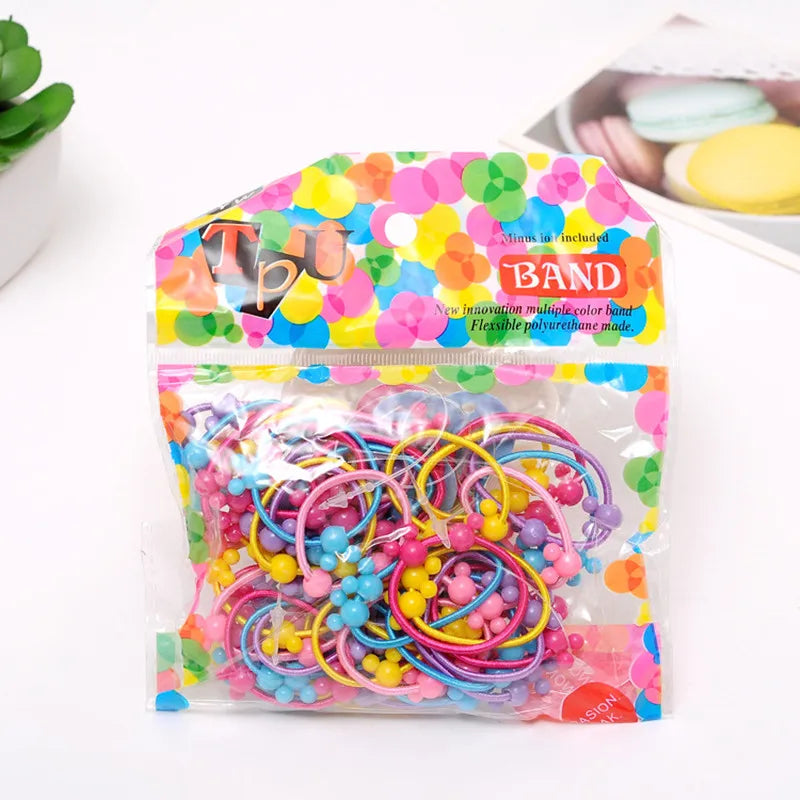 A lot of 50 PCS Hair Rubber Band, 3 CM in Diameter (a little more than one inch).